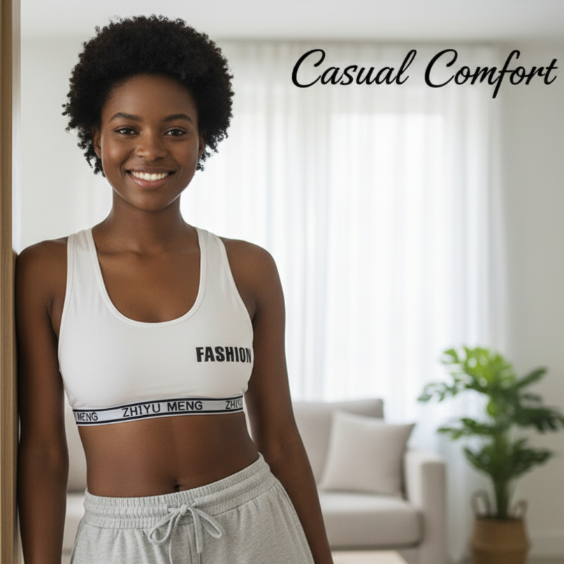 Woman wearing a sports bra and sweatpants with 'Casual Comfort' text in a living room setting.