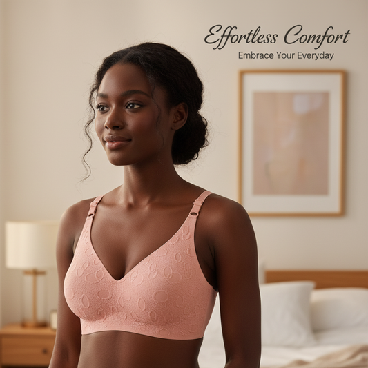 Woman wearing a pink bralette and skirt in a bedroom setting with 'Effortless Comfort' text.